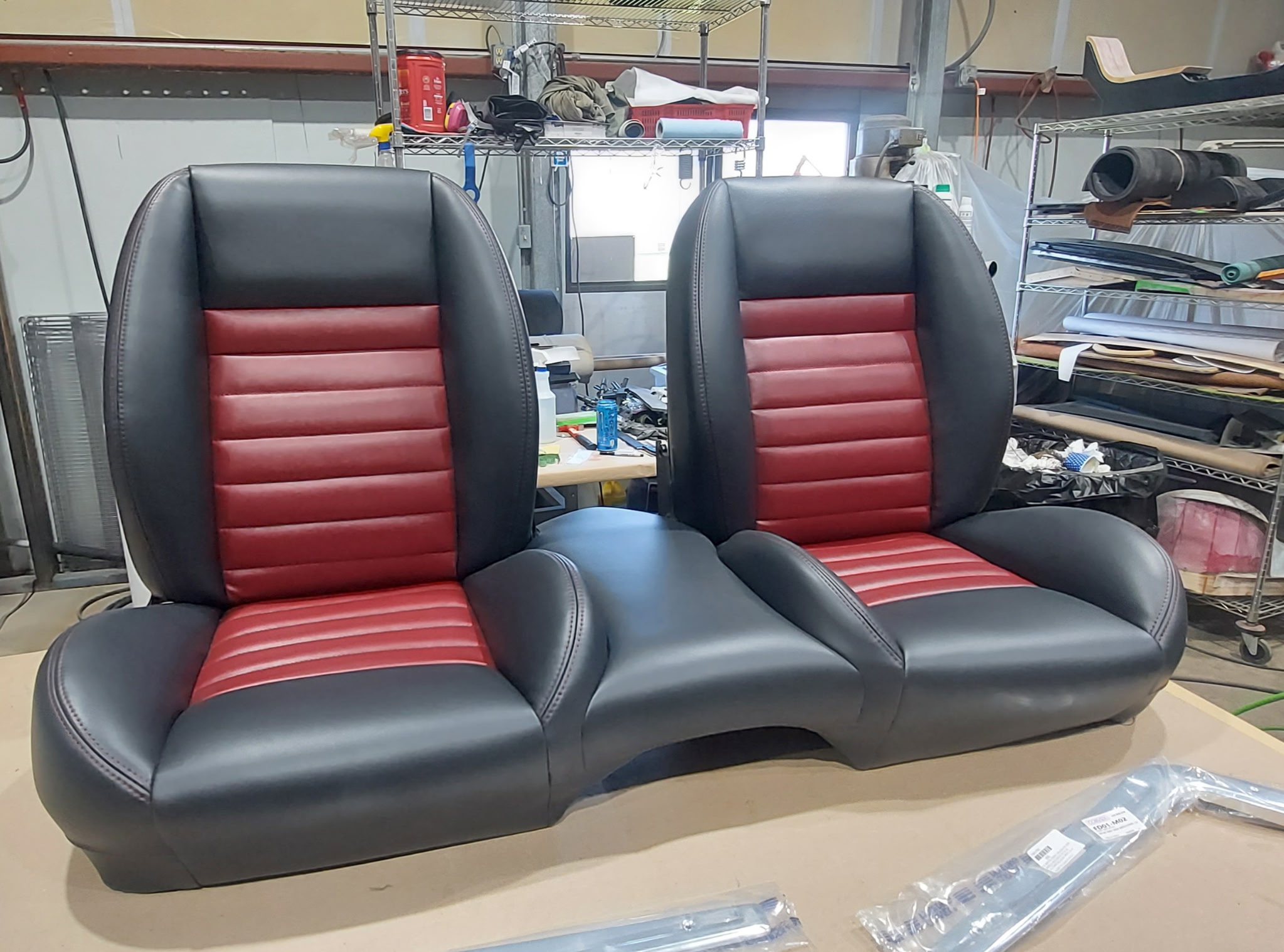 Custom leather upholstery work featuring hand-stitched seats and premium leather materials